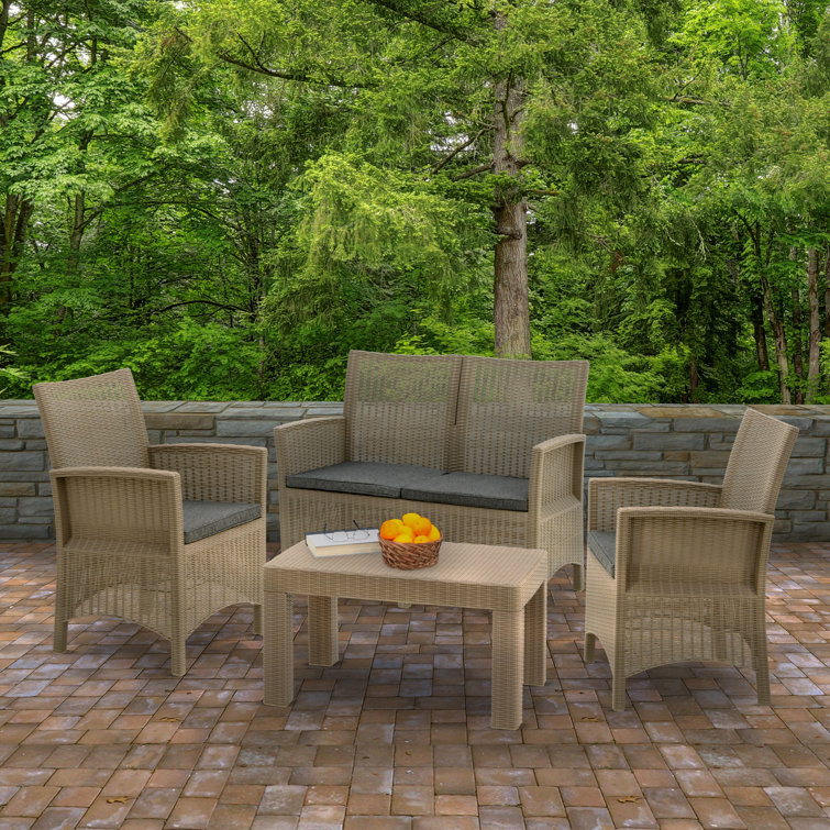 Lark Manor Huffine Wicker/Rattan 4 Person Seating Group with Cushions